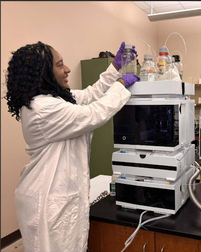 Alexia Cole uses an LC-MS/MS instrument to detect new types of drugs in water samples.