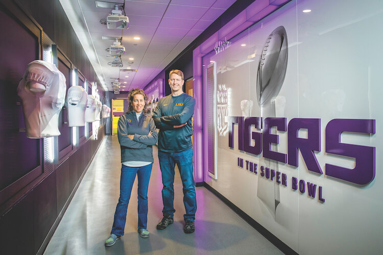 Shelley Mullinex and Neil Johannsen in LSU Football locker room