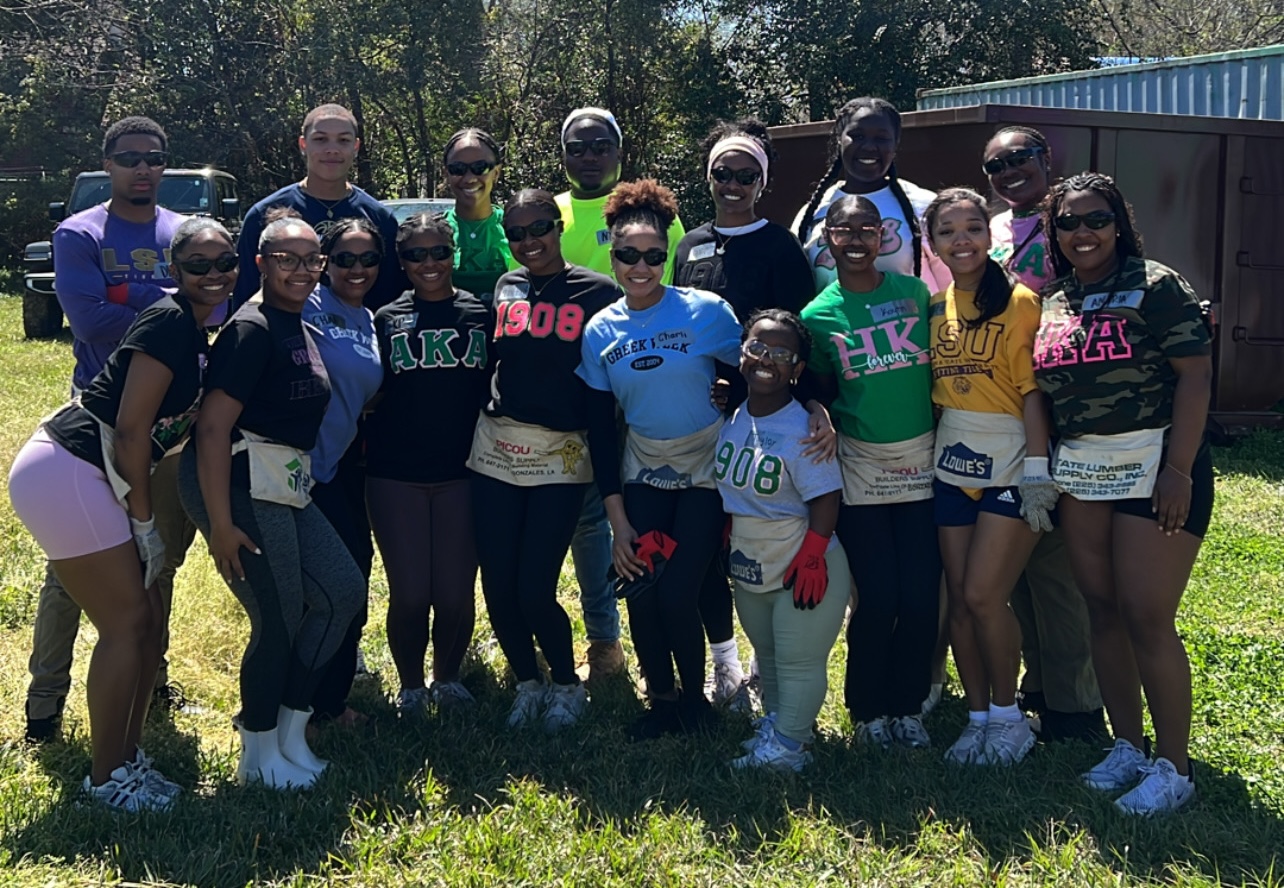Group photo of greek life students completing a service project