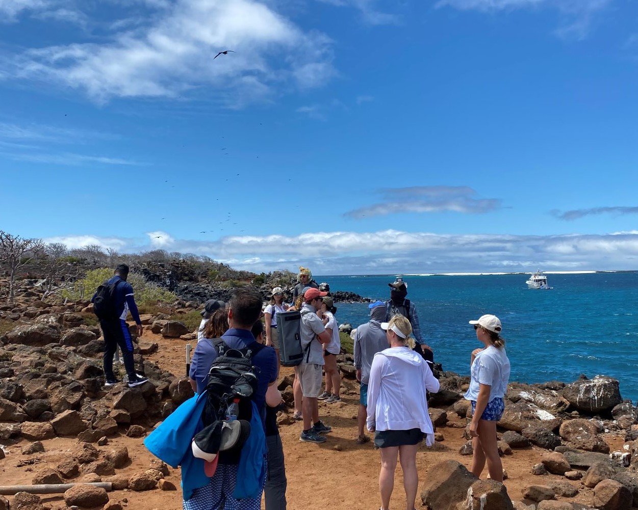 Group exploring a beach in the Galapagos