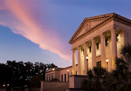 Image of the LSU Law Center building at sunset.
