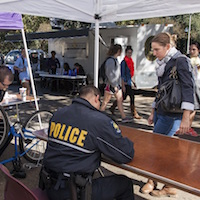 Students ask police questions at safety day.