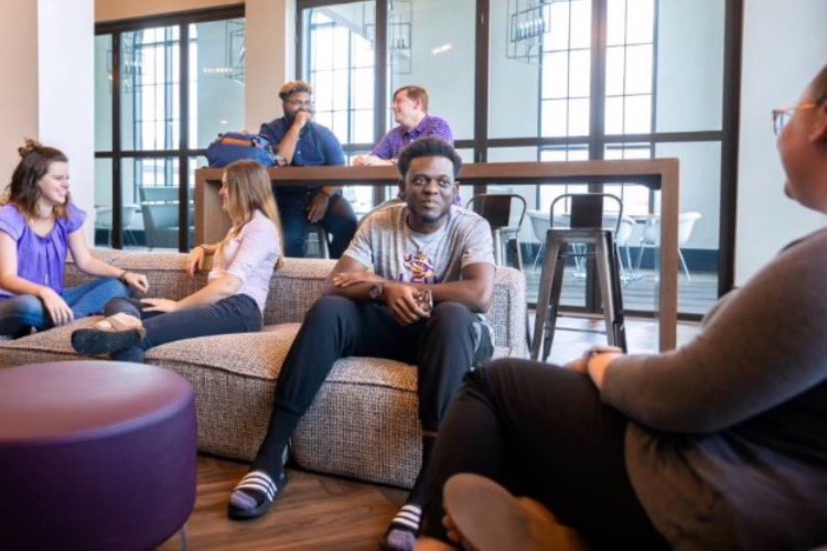 students in residence hall lobby